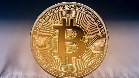 "بيتكوين" تتراجع إلى ما دون 25 ألف دولار