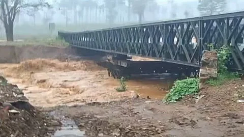 Punnapuzha River flows near the Bailey Bridge