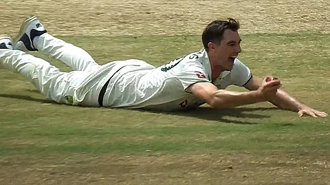 Cummins' diving catch