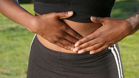 A women touching stomach