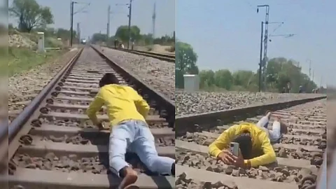 पटरी पर लेटकर ऊपर से गुजरती ट्रेन का बनाया वीडियो, पुलिस ने किया गिरफ्तार