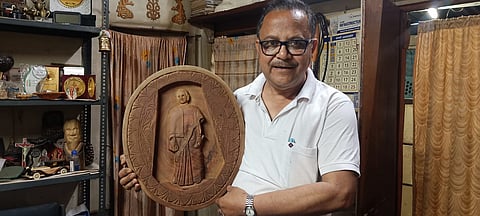 Panchayat Pradhan with handmade artwork