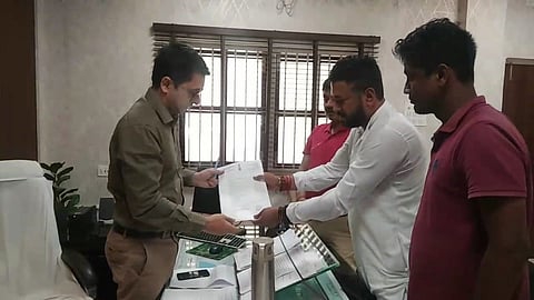 MLA Shankar Ghosh handing over the memorandum