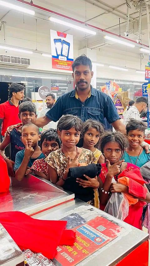 Children with Shakti Paul, founder of Unique Foundation