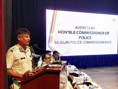 Police officers holding a meeting with puja committees