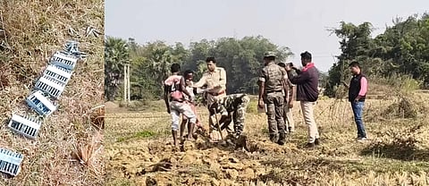 शालबनी में खेत से बरामद कारतूस और मौके पर पहुंचे पुलिस अधिकारी