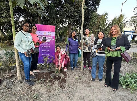 Members of Rotary Uttarayan Believers with Kiran Kayan planting a tree