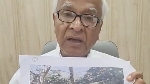 हिंदू श्मशान भूमि पर शराब बार निर्माण के मामले में सांसद बिष्णु पद रे सीबीआई जांच की मांग करते हुए संबंधित दस्तावेज दिखाते हुए