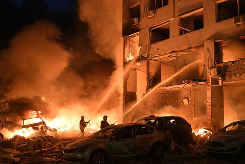 Firefighters extinguishing the fire