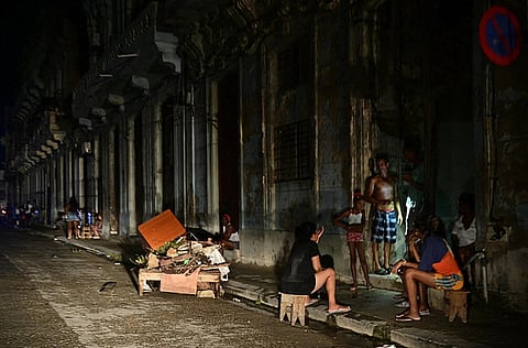 People spending the night outside their homes due to the darkness