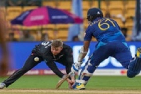 Bengaluru: Sri Lanka's Maheesh Theekshana safely reaches the crease during the ICC Men's Cricket World Cup 2023 match between New Zealand and Sri Lanka, at M. Chinnaswamy Stadium, in Bengaluru, Thursday, Nov. 9, 2023. (PTI Photo/Shailendra Bhojak) (PTI11_09_2023_000295B)