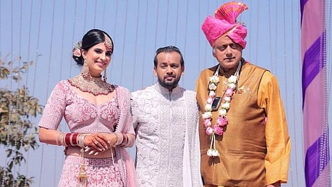 Shashi Tharoor posed with the newlywed couple.