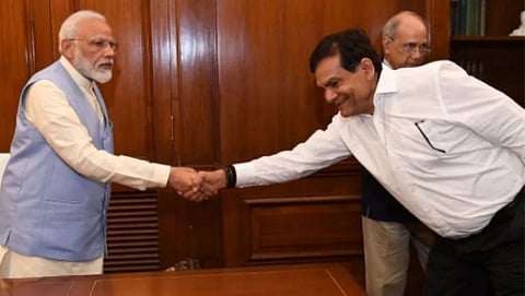 Narendra Modi and A K Mishra 