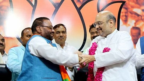 Swami Prasad Maurya and Amit Shah