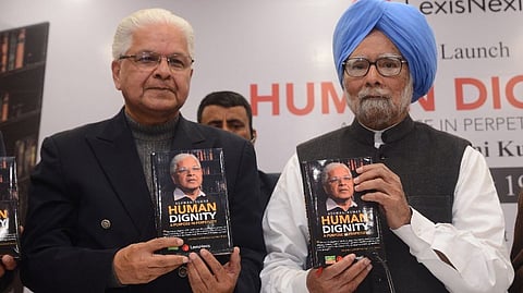 Ashwani Kumar with Manmohan Singh