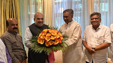 Basavraj Horatti with Amit Shah and Basavraj Bommai
