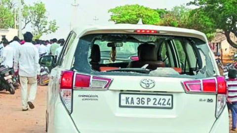 Car glass broken by stone pelting