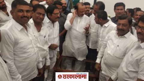 Nandkumar More and supporter with Ajit Pawar