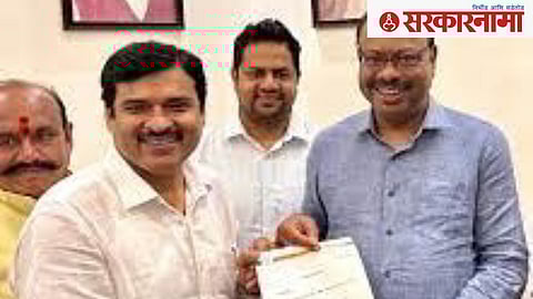 Prakash Balbuddhe with Chandrashekhar Bawankule.