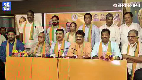 Goa Chief Minister Pramod Sawant with the eight Congress MLAs who joined his Bharatiya Janata Party