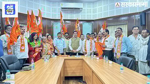 Former corporators from BJP, MNS, and BSP join Eknath Shinde's Shiv Sena in Nagpur, signaling a major political realignment.