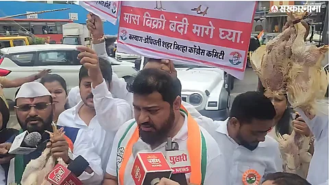 Protesters gathered outside Kalyan-Dombivli Municipal Corporation opposing the chicken and mutton sale ban.