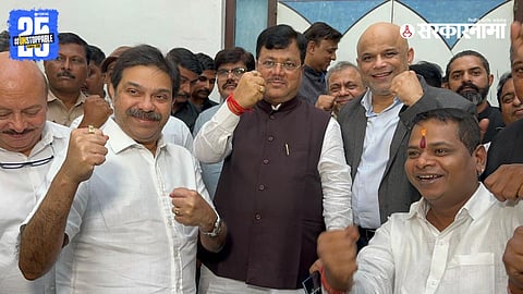 Pravin Darekar celebrates with supporters after his BJP-backed panel wins all seats in the Maharashtra Boxing Association elections.
