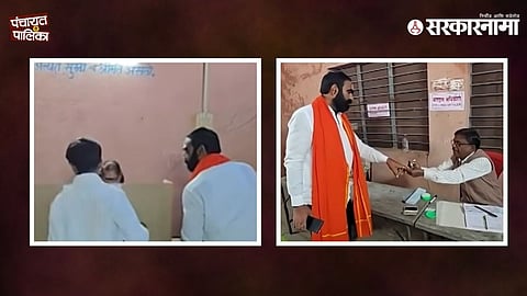 Shiv Sena MLA Santosh Bangar caught on video guiding a voter inside polling booth during Kalmnuri civic election.