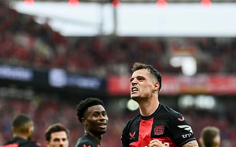Bayer Leverkusen romps past Bremen to clinch first Bundesliga title
