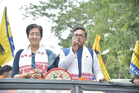 AAP leader Atishi Marlena leads massive road show in Duliajan town in support of Manoj Dhanowar