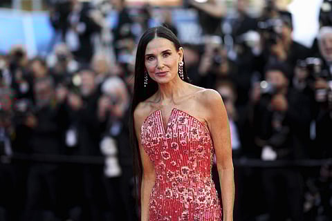 American actress Demi Moore slays in red beaded gown at Cannes red carpet