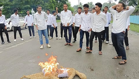 AASU Burns Effigy of BVFCL CMD Pradip Kumar Banik; Amid Corruption Allegations, Demands Resignation