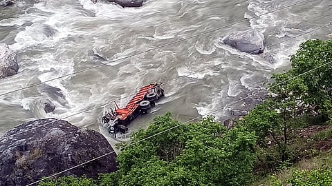 Truck Carrying Iron Rods Plunges Into Desang River After Bridge Railing Breaks in Sivasagar