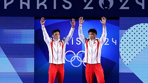 Paris Olympics: Chinese divers Wang Zongyuan, Long Daoyi win men’s synchro 3m springboard gold