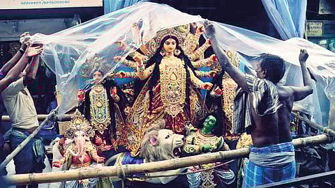 Silchar Puja Organizers on Edge as Heavy Rain Forecast Threatens Final Preparations