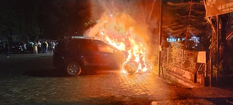 Luxury car catches fire