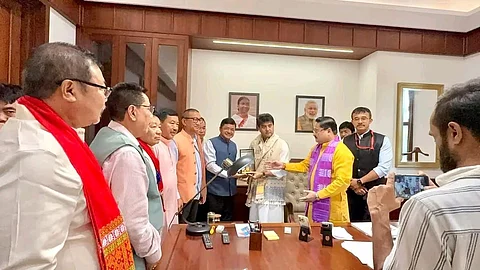 CEM of the Karbi Anglong Autonomous Council, Tuliram Ronghang submitting a memorandum to Jyotiraditya M. Scindia, Union Minister for Communications and Development of North Eastern Region DoNer