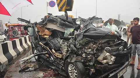 The overturned Bolero pickup van just after the accident.