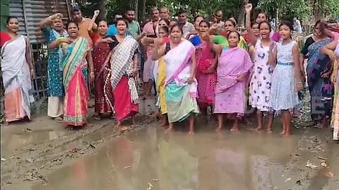 Image of Villagers protesting for better roads and amenities