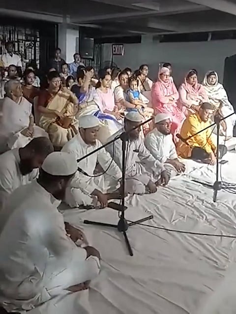 Image of Muslim Community people praying in Zubeen Garg’s Kahilipara residence for the peace of his soul