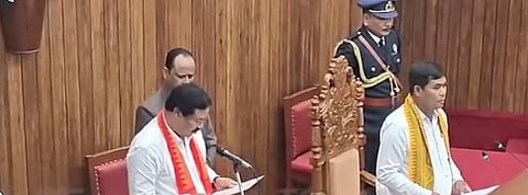 Image of a newly elected member of BTC, swearing in during the oath-taking ceremony