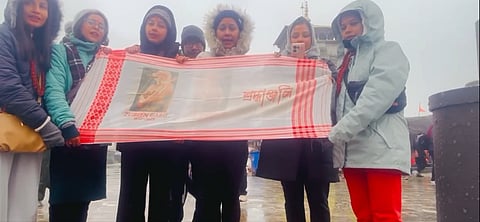 Image of a group of women from Assam paying tribute to late music icon Zubeen Garg at the Kedarnath Temple