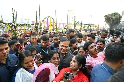 Image of Assam Chief Minister meeting the Bihari community people at Pandu Ghat on the last day of Chhath Puja