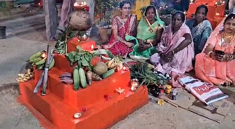 Image of devotees offering prayer in Jia Bharali Ghat at Jamugurihat on the occasion of Chhath Puja