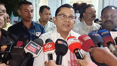 Image of Assam Power Minister Prasanta Phukan while speaking to the media during his Barpeta Satra visit