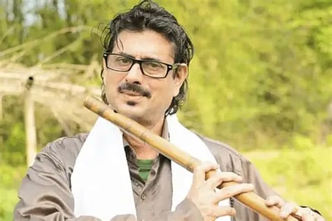 File photo of Assam's late renowned flutist, Dipak Sarma