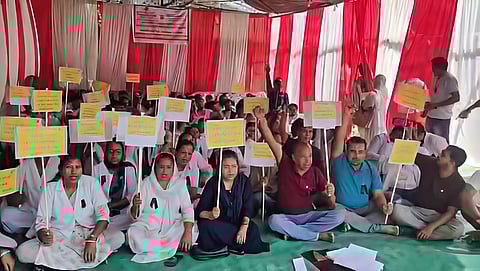 Image of the protest by employees of the National Health Mission NHM entered its second day today in Hatsingimari dressed in black attire as a mark of protest