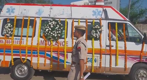 Image of the flower-decked ambulance carrying the mortal remains of Assam's renowned flutist Dipak Sarma