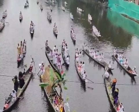 Image of the boat procession in Majuli