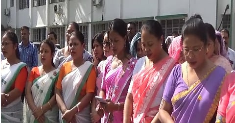 Image of the mass performance led by officials, artists and citizens during 150th anniversary celebration of Vande Mataram at Dibrugarh Commissioner's Office
